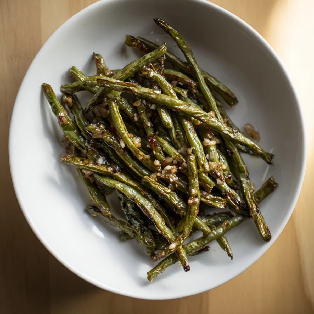 Garlic roasted green beans, crispy-looking side dish, ready to be served with a delicious aroma.