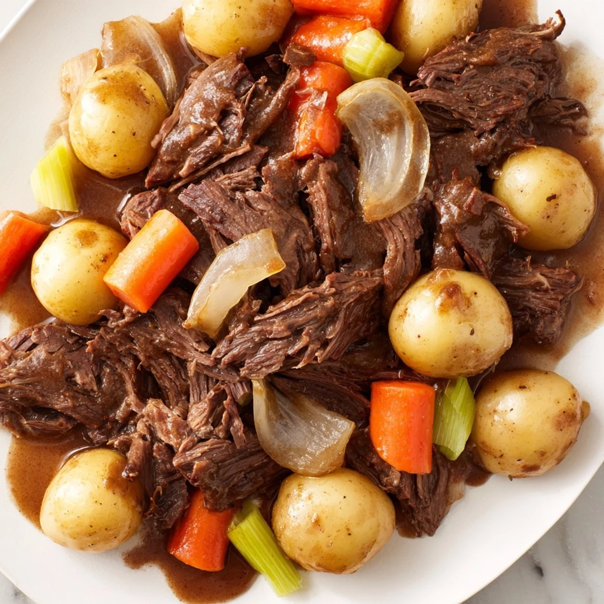 Tender slow cooked pot roast, a steaming, delicious American comfort food with vegetables.