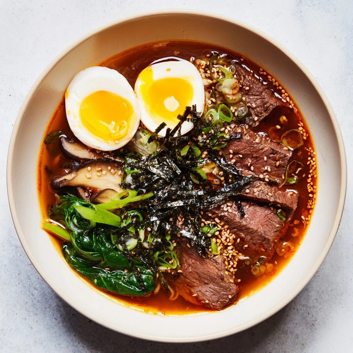 Enjoy the savory aroma and taste of this homemade spicy beef ramen with fresh noodles.