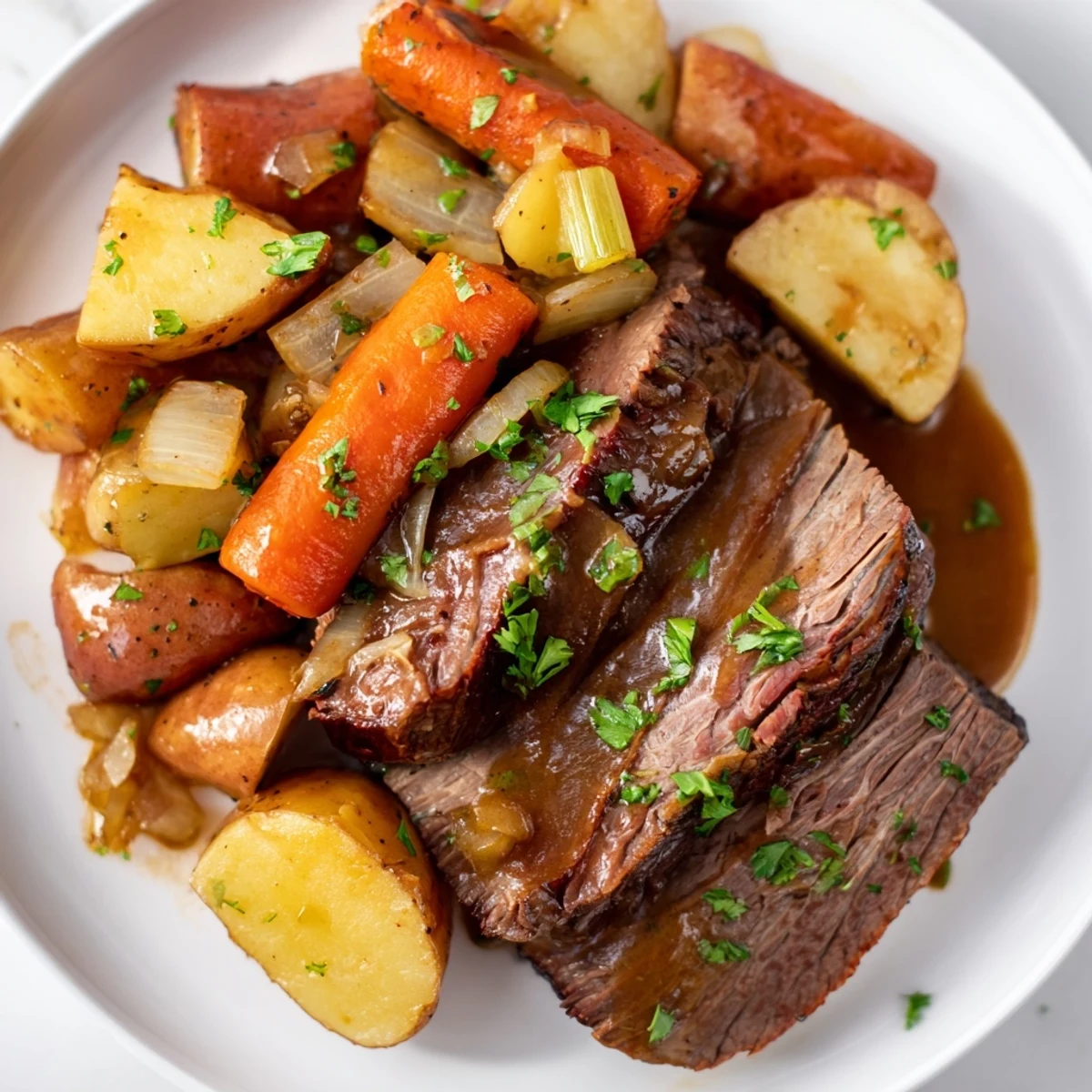 Slow Cooker Beef Pot Roast with Root Vegetables simmers in a savory thyme-infused broth for hours.