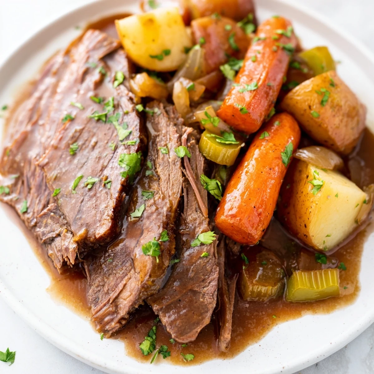 Golden brown beef chuck roast nestled with tender carrots, parsnips, and potatoes in the slow cooker.