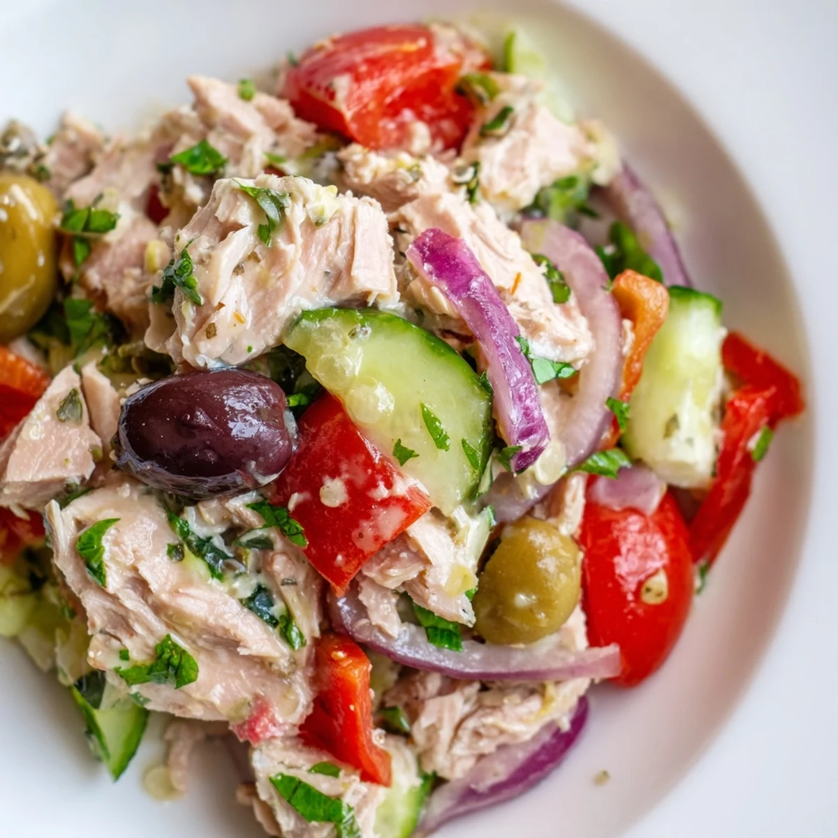 Mediterranean tuna salad tossed with crisp cucumber, red peppers, and briny capers