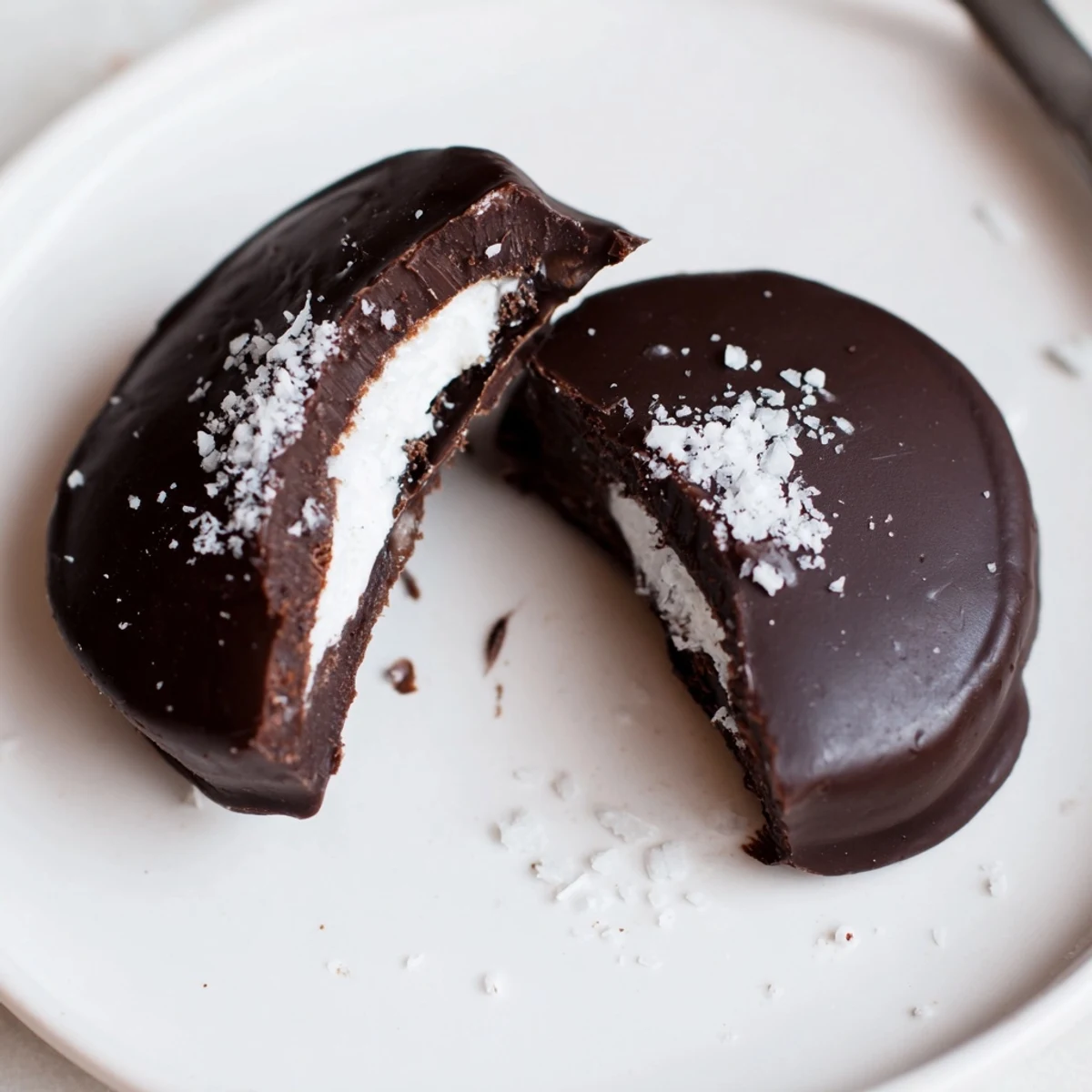 Homemade Peppermint Patties chilled and stacked, perfect after dinner minty treats.