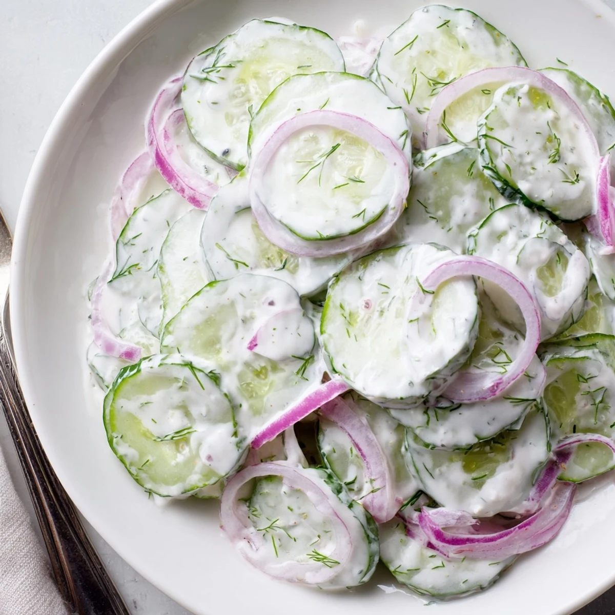Tzatziki Cucumber Salad Recipe brimming with creamy dill yogurt and crisp cucumbers