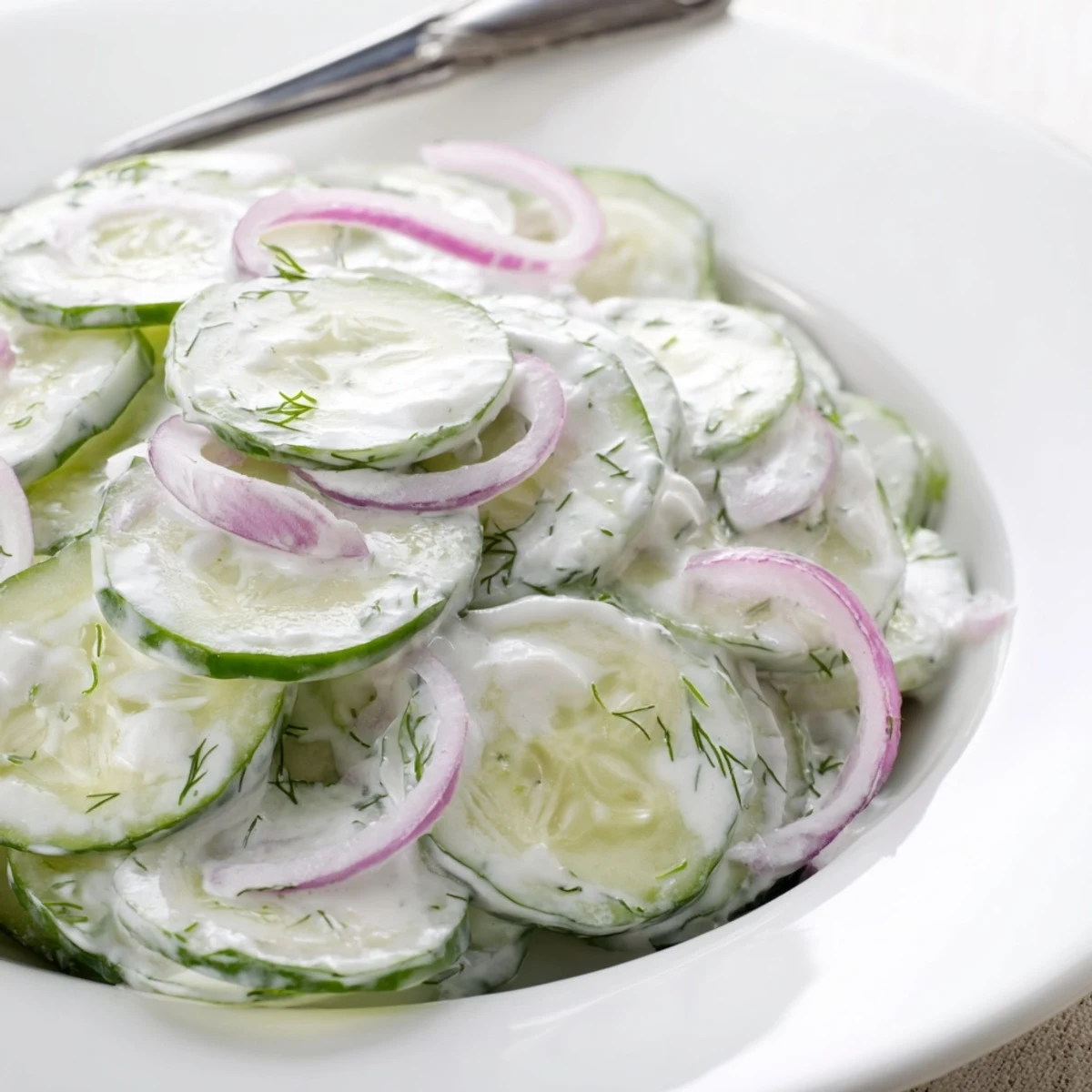 Serve Tzatziki Cucumber Salad Recipe alongside grilled chicken or warm pita, bright