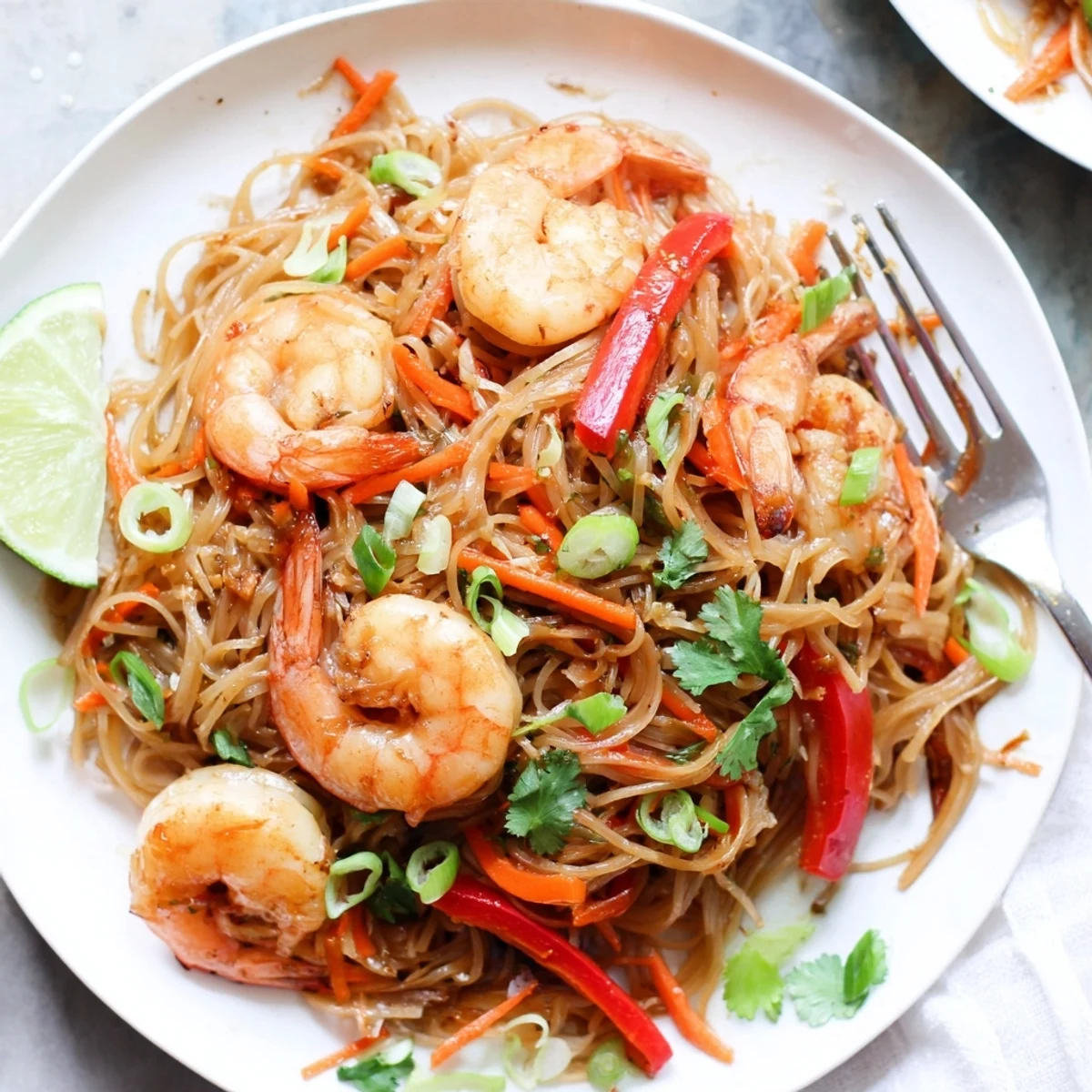 Warm Spicy Garlic Shrimp Noodles Recipe tossed in garlic, chili, green onions