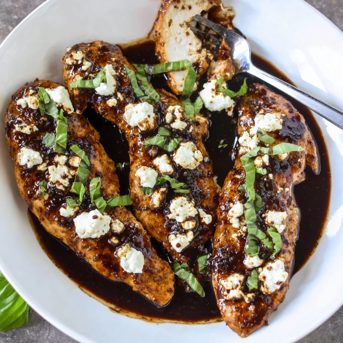 Crisp-roasted breasts in Sweet Tangy Balsamic Chicken with Goat Cheese & Basil, fragrant