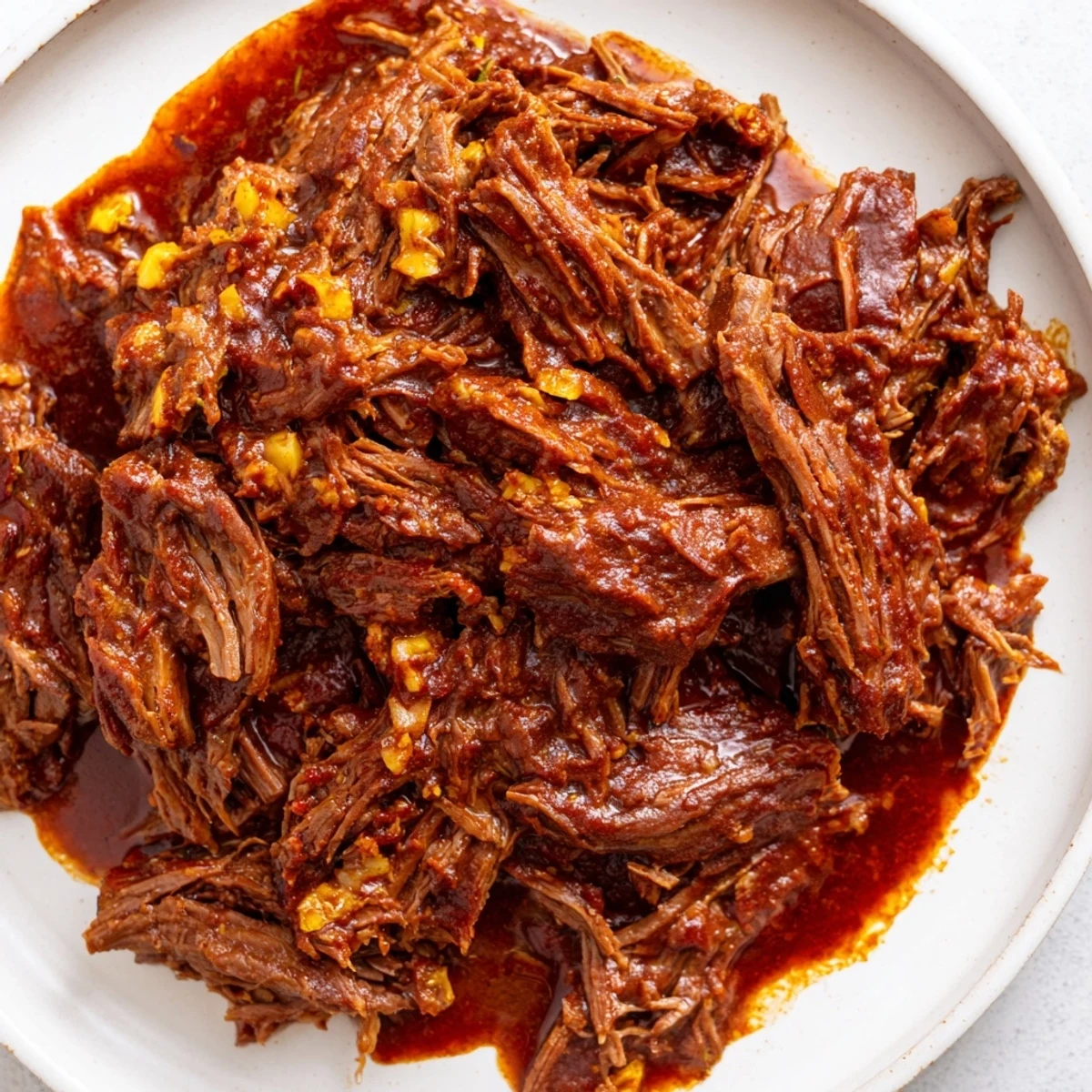 Spicy Mexican-style beef barbacoa slow cooked for hours until falling apart with chipotle flavor