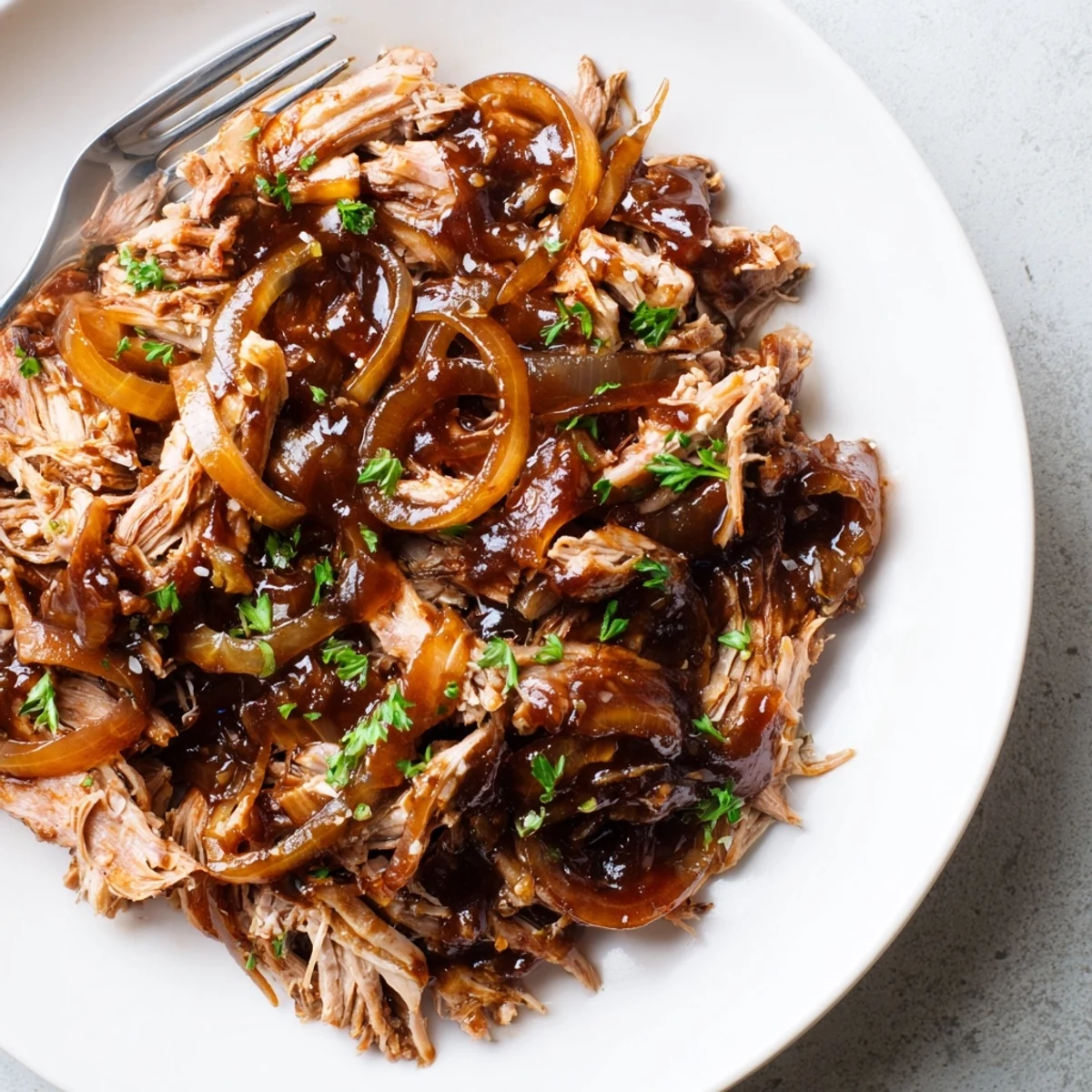 Slow Cooker Balsamic Chicken surrounded by roasted vegetables for a cozy weeknight dinner