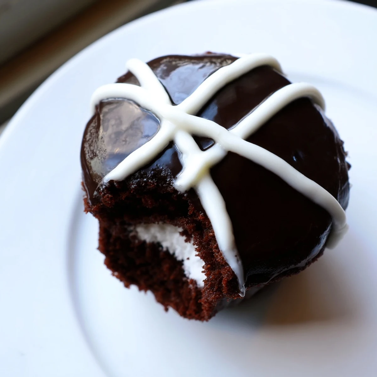 Rich Homemade Hostess Cupcakes bursting with fluffy marshmallow center and smooth chocolate topping