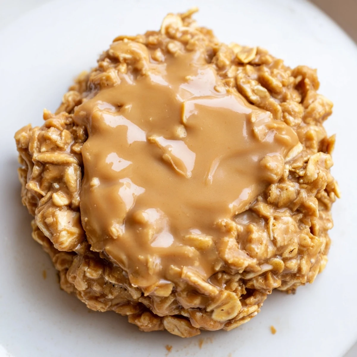 Rich, chewy peanut butter no bake cookies topped with creamy oats.  