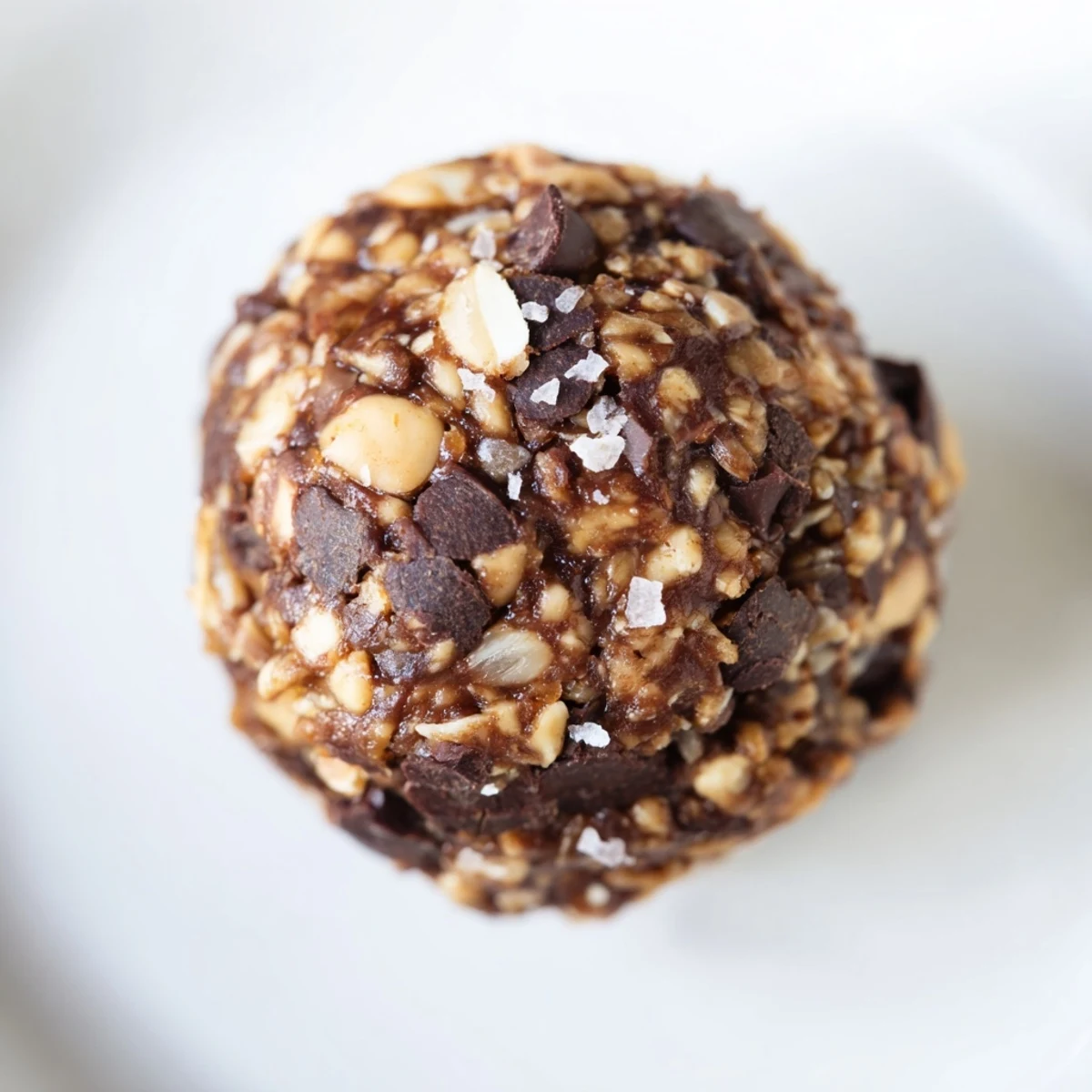 No-bake Snickers energy balls showcasing creamy peanut butter and dark chocolate chunks.  